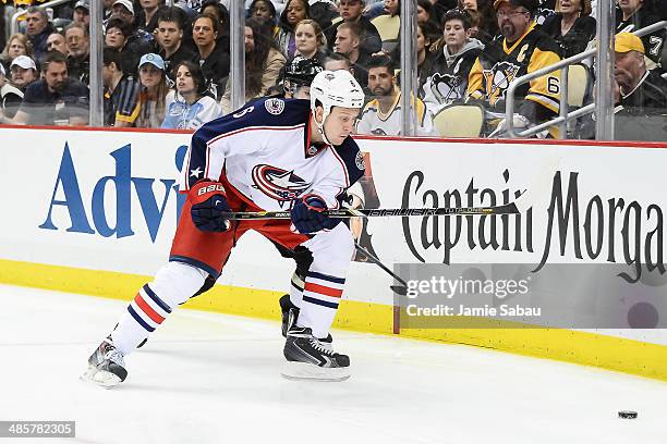 Nikita Nikitin of the Columbus Blue Jackets skates with the puck against the Pittsburgh Penguins in Game Two of the First Round of the 2014 NHL...