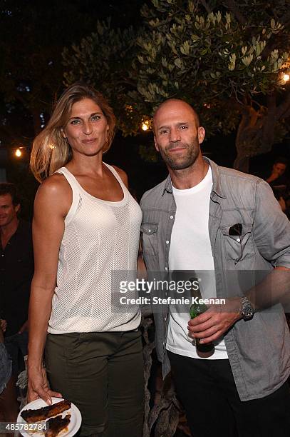 Gabrielle Reece and Jason Statham attend Kelly Slater, John Moore and Friends Celebrate the Launch of Outerknown at Private Residence on August 29,...