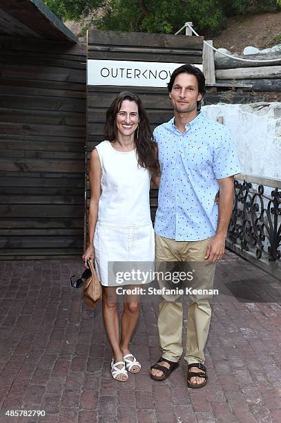 Elizabeth Varnell and Danny Olivas attend Kelly Slater, John Moore and Friends Celebrate the Launch of Outerknown at Private Residence on August 29,...