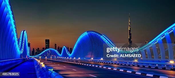 to infinity & beyond - dubai bridge stock pictures, royalty-free photos & images