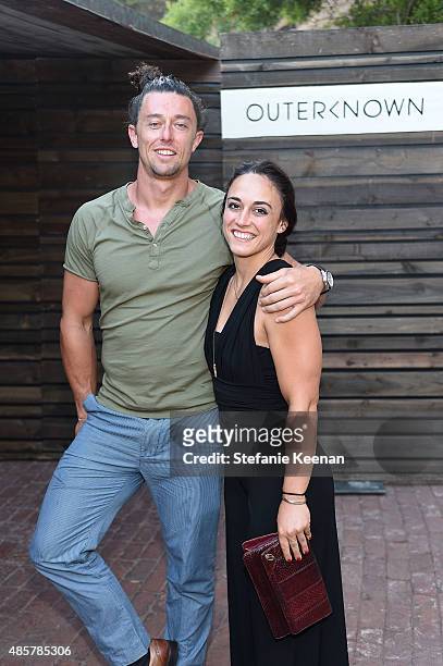 Logan Gelbrich and Lindsay Gelbrich attend Kelly Slater, John Moore and Friends Celebrate the Launch of Outerknown at Private Residence on August 29,...