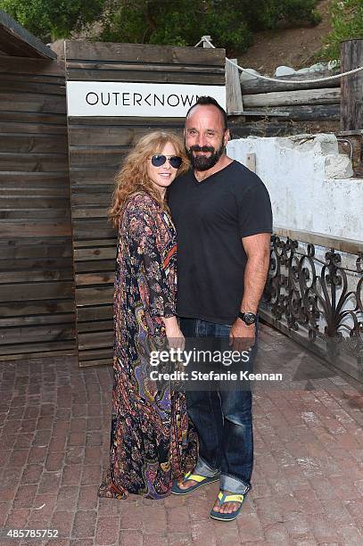 Kimberly Muller and Michael Muller attend Kelly Slater, John Moore and Friends Celebrate the Launch of Outerknown at Private Residence on August 29,...