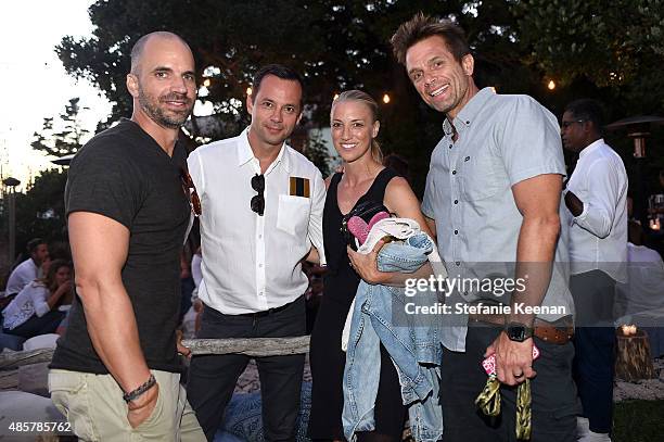 Todd Hymel, Laurent Claquin, Susan Chokachi and David Chokachi attend Kelly Slater, John Moore and Friends Celebrate the Launch of Outerknown at...