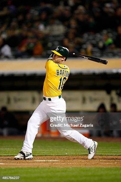 Daric Barton of the Oakland Athletics bats during the game against the Cleveland Indians at O.co Coliseum on March 31, 2014 in Oakland, California....