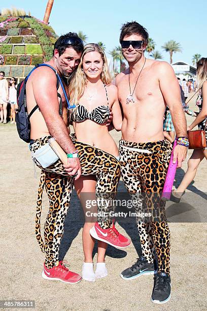 Music fans Taylor Lockhead and Shane Kelly of New Zealand and Julia Vineyard of Orange County, California attend day 3 of the 2014 Coachella Valley...