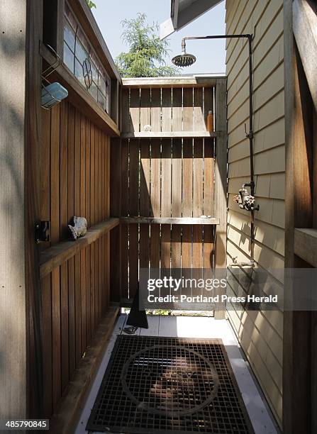 Gregory Rec/Staff Photographer: -- The back deck of Sharan Townsend's 1920s bungalow on Franklin Terrace in South Portland has an outdoor shower....