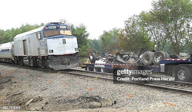 Published on Thursday, July 14, 2011. A caption on Page A4 Wednesday should have identified a train car as a ''cab bag'' car. Though it once had an...