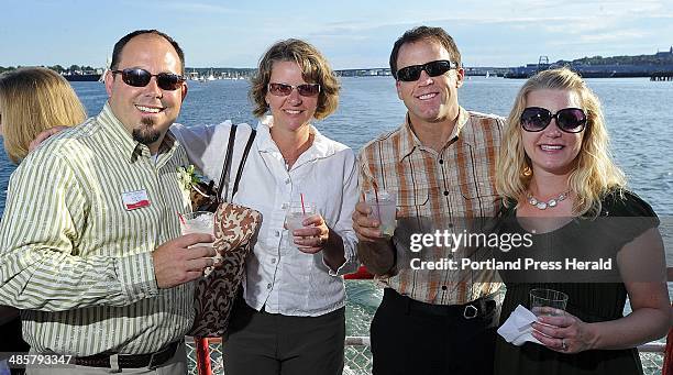 Photo by Gordo Chibroski/Staff Photographer. Thursday, July 14, 2011. Snapshots from 40Under40 event on Casco Bay. L-R: Scott Townsend, Scarborough,...