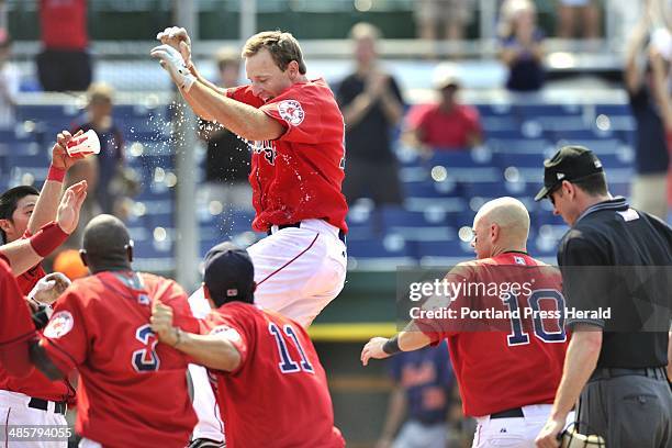 Photo by John Ewing/staff photographer -- Wednesday, July 20, 2011 -- Portland Sea Dogs vs. The Binghamton Mets at Hadlock Field. Sea Dog left...