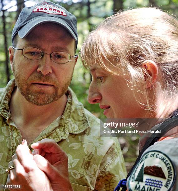 Kat Franchino/Staff Photographer: Tuesday, June 15, 2010 -- Forest entomologist Allison Kanoti and Portland Press Herald reporter Ray Routhier...