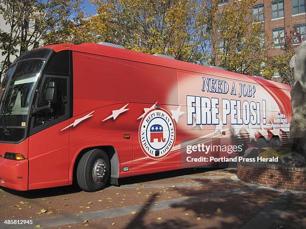 Photo by Glenn Jordan/Staff Writer: The Republican National Committee brought its red "Fire Pelosi" bus to Portland Friday for a fund-raising...