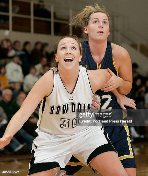 Colleen Sweeney of Bowdoin prepares for a rebound by boxing out..., News Photo