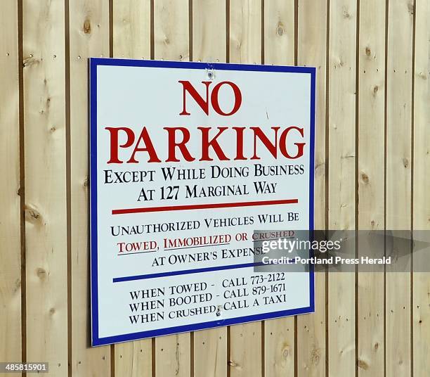 Gordon Chibroski/ Staff Photographer. Thursday, November 18, 2010. Sign near Rock Gym warning about towing and other alternatives for non-complying...
