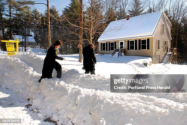 Doug Jones/Staff Photographer, Tuesday, January 27, 2009: Julie Bayley's agents, Michelle Clark, left, and Michelle Fournier, in Waterboro are...