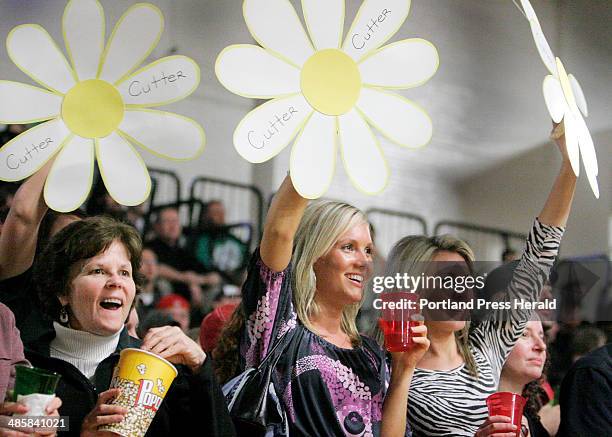 Jill Brady/Staff Photographer: -- From left, Kathy Donahue of Kennebunk, Catherine Bolster of Portland and Kathryn Larochelle of Saco cheer for Daisy...