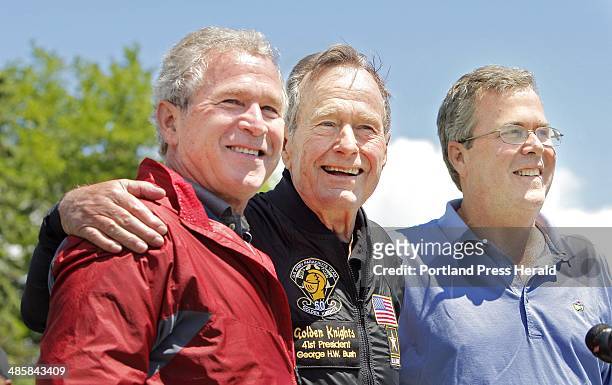 Published Sunday, June 14, 2009: A photo cutline on Page A11 Saturday should have said former President George H. W. Bush poses with his sons former...