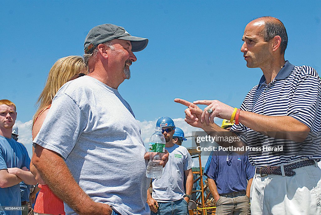 Governor John Baldacci visits the scene of the Washburn & Doughty Shipyard fire in East Boothbay Ha
