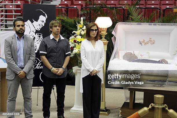 Salsa singer Gerardo Rivas, songwriter Jose Hernandez and singer Nydia Caro stand guard at the funeral service for Cheo Feliciano at Coliseo Roberto...