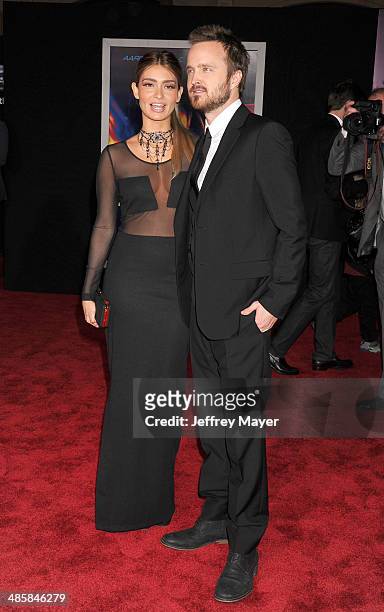 Actor Aaron Paul and wife Lauren Parsekian arrive at the Los Angeles premiere of 'Need For Speed' at TCL Chinese Theatre on March 6, 2014 in...