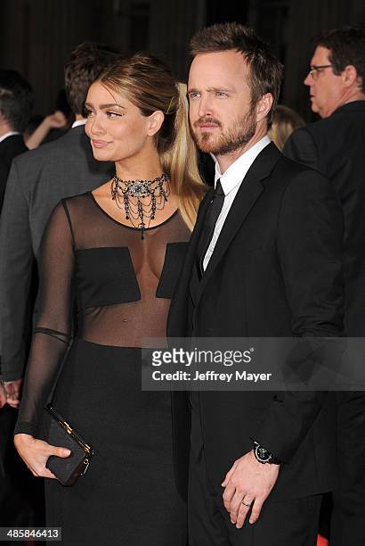 Actor Aaron Paul and wife Lauren Parsekian arrive at the Los Angeles premiere of 'Need For Speed' at TCL Chinese Theatre on March 6, 2014 in...