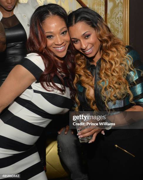 Mimi Faust and Karlie Redd attend a party at Aurum Lounge on April 16, 2014 in Atlanta, Georgia.