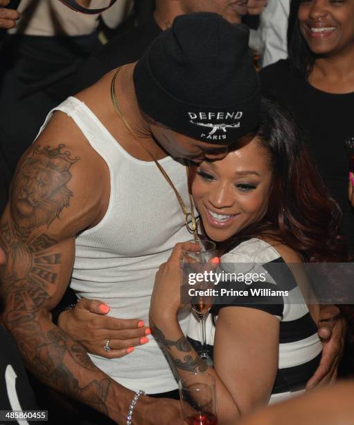 Nikko Smith and Mimi Faust attend a party at Aurum Lounge on April 16, 2014 in Atlanta, Georgia.