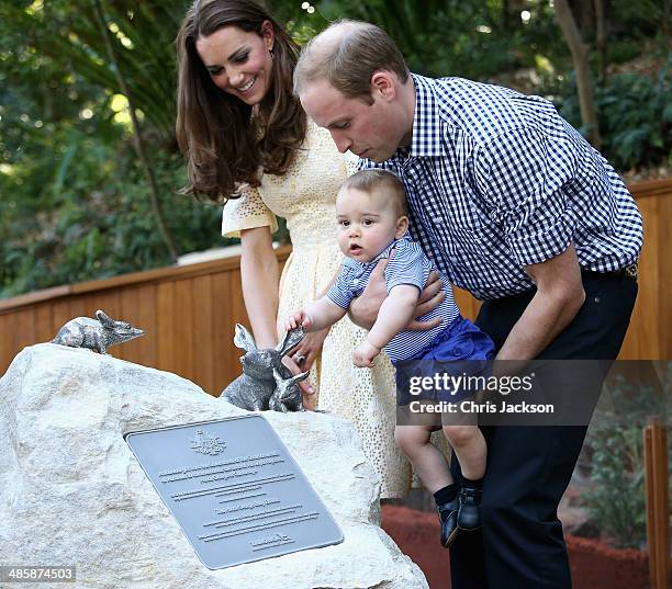 Catherine, Duchess of Cambridge, Prince George of Cambridge and Prince William, Duke of Cambridge unveil a plaque for the new Bilby Enclosure at...