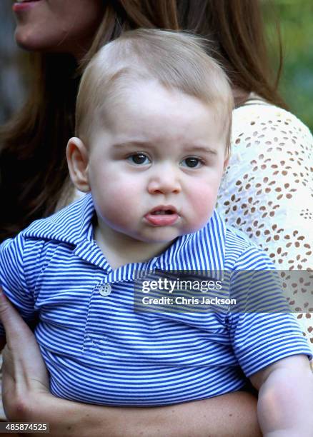 Catherine, Duchess of Cambridge holds Prince George of Cambridge as they visit the Bilby Enclosure at Taronga Zoo on April 20, 2014 in Sydney,...