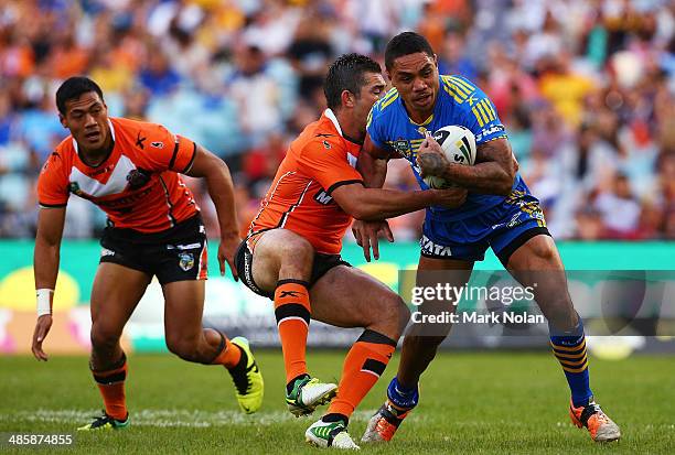 Willie Tonga of the Eels is tackled during the round seven NRL match between the Parramatta Eels and the Wests Tigers at ANZ Stadium on April 21,...