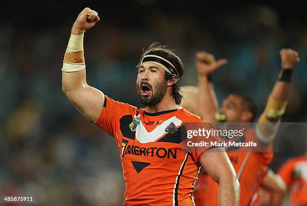 Aaron Woods of the Tigers celebrates victory at the end of the round seven NRL match between the Parramatta Eels and the Wests Tigers at ANZ Stadium...