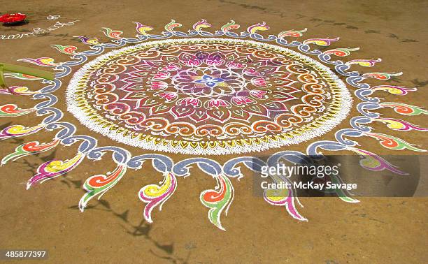 indian kolam chalk art design - rangoli stock pictures, royalty-free photos & images