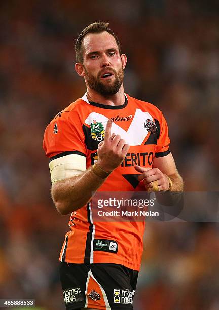 Pat Richards of the Tigers celebrates a penalty goal during the round seven NRL match between the Parramatta Eels and the Wests Tigers at ANZ Stadium...