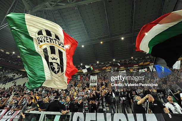 Juventus fans show their support durig the UEFA Europa League quarter final match between Juventus and Olympique Lyonnais at Juventus Arena on April...