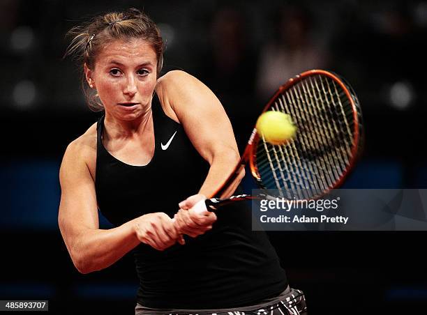 Annika Beck of Germany hits a backhand during her first round match against of the Katerina Vankova of the Czech Republic on day one of the Porsche...