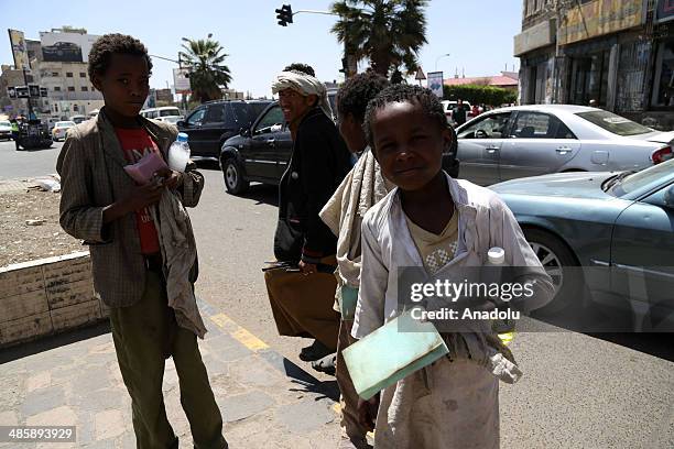 Child labors work on the streets due to poverty in Sanaa, Yemen, regarded the most poor country in Arabian Peninsula, on 20 April 2014. Child labors...