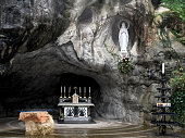 Statue of the Virgin Mary in the grotto of Lourdes