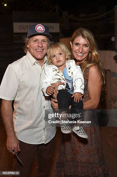 Richard Woolcott, Wolfie Woolcott and Cari Woolcott attend Kelly Slater, John Moore and Friends Celebrate the Launch of Outerknown at Private...