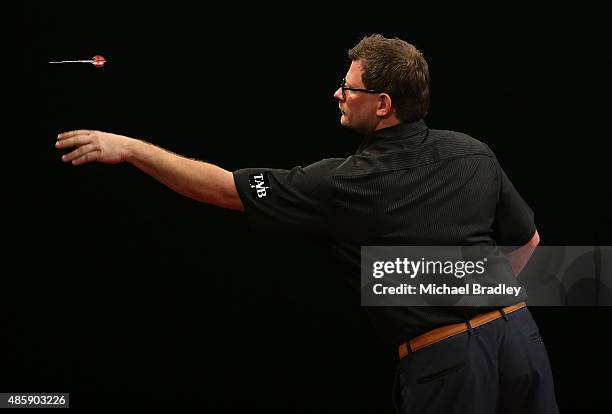 James Wade in action during the Auckland Darts Masters at The Trusts Arena on August 30, 2015 in Auckland, New Zealand.