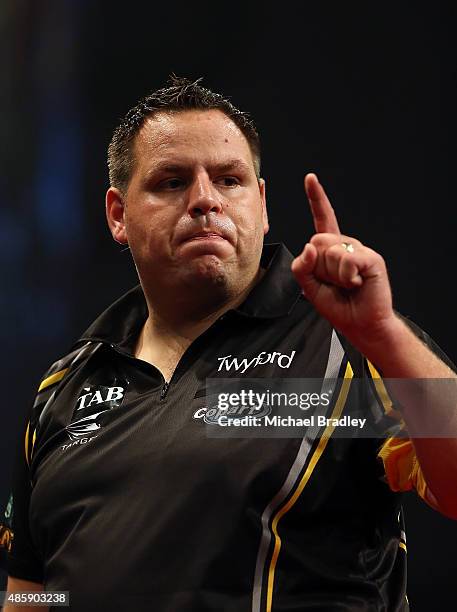Adrian Lewis ina action during the Auckland Darts Masters at The Trusts Arena on August 30, 2015 in Auckland, New Zealand.
