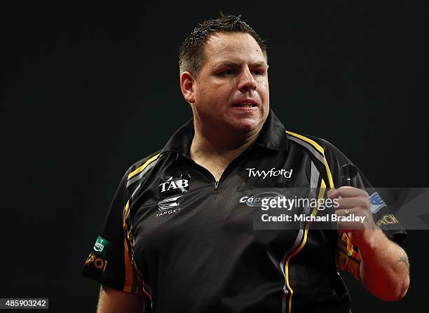 Adrian Lewis ina action during the Auckland Darts Masters at The Trusts Arena on August 30, 2015 in Auckland, New Zealand.