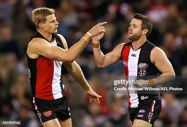 Nick Riewoldt and Adam Schneider of the Saints celebrate during the 2015 AFL round 22 match between the St Kilda Saints and the Sydney Swans at...