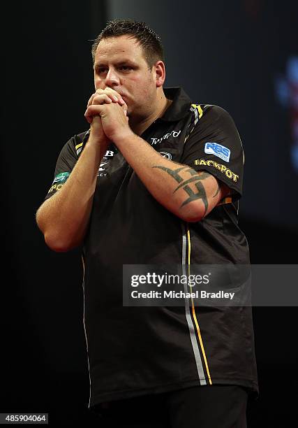 Adrian Lewis reacts during the Auckland Darts Masters at The Trusts Arena on August 30, 2015 in Auckland, New Zealand.