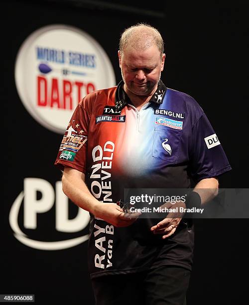 Raymond van Barneveld reacts during the Auckland Darts Masters at The Trusts Arena on August 30, 2015 in Auckland, New Zealand.