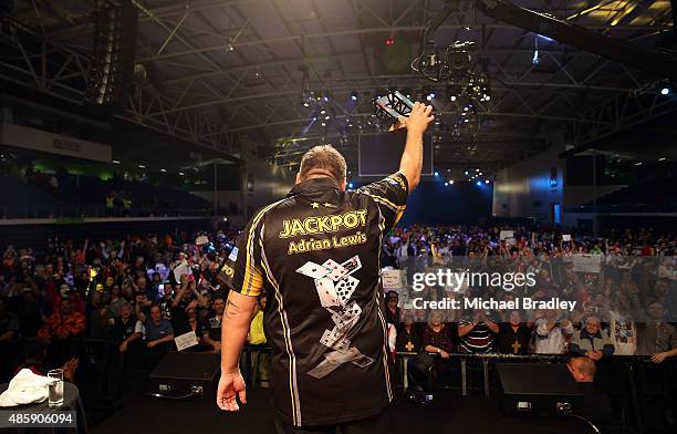 Adrian Lewis celebrates winning the final during the Auckland Darts Masters at The Trusts Arena on August 30, 2015 in Auckland, New Zealand.