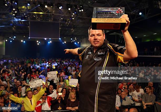 Adrian Lewis celebrates winning the final during the Auckland Darts Masters at The Trusts Arena on August 30, 2015 in Auckland, New Zealand.