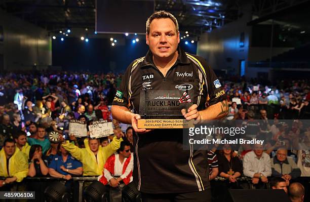 Adrian Lewis celebrates winning the final during the Auckland Darts Masters at The Trusts Arena on August 30, 2015 in Auckland, New Zealand.