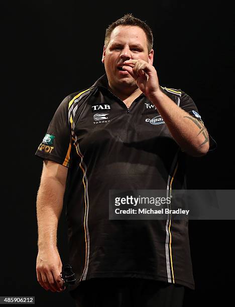 Adrian Lewis reacts during the final against Raymond van Barneveld during the Auckland Darts Masters at The Trusts Arena on August 30, 2015 in...