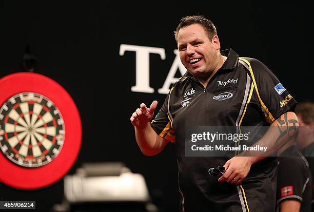 Adrian Lewis reacts during the final against Raymond van Barneveld during the Auckland Darts Masters at The Trusts Arena on August 30, 2015 in...