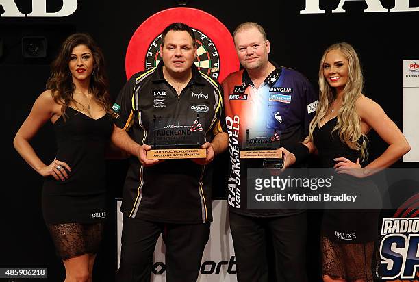 Adrian Lewis with runner up Raymond van Barneveld during the Auckland Darts Masters at The Trusts Arena on August 30, 2015 in Auckland, New Zealand.