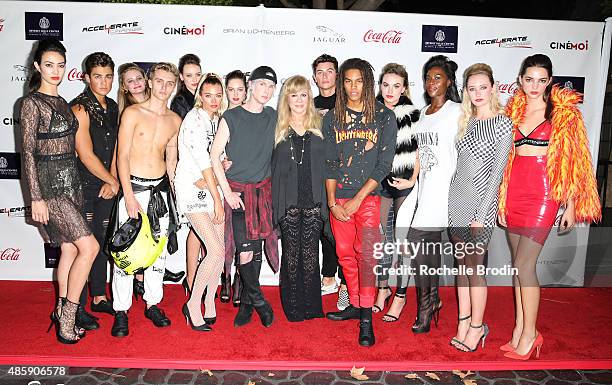 Fashion designer Brian Lichtenberg, Daphna Ziman of Warner Estate and the models in the fashion show attend the Accelerate4Change charity event...